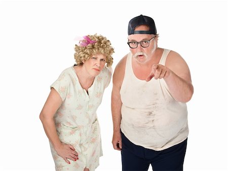 Snickering older couple with dirty clothes on white background Stock Photo - Budget Royalty-Free & Subscription, Code: 400-04206689