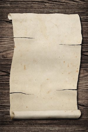 Old grungy paper close up,  on wooden table. Stock Photo - Budget Royalty-Free & Subscription, Code: 400-04206694