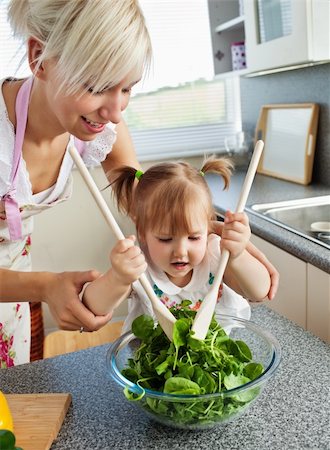 simsearch:400-04206231,k - Bright mother and child cooking in kitchen Stock Photo - Budget Royalty-Free & Subscription, Code: 400-04206875