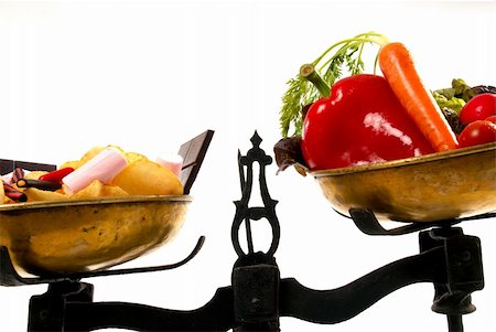 Choice between healthy and unhealthy food on vintage scales, healthcare concept Stock Photo - Budget Royalty-Free & Subscription, Code: 400-04207563