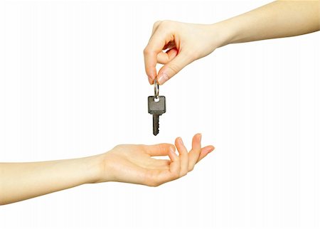 simsearch:400-04663994,k - hand holds a key isolated on white Photographie de stock - Aubaine LD & Abonnement, Code: 400-04207596