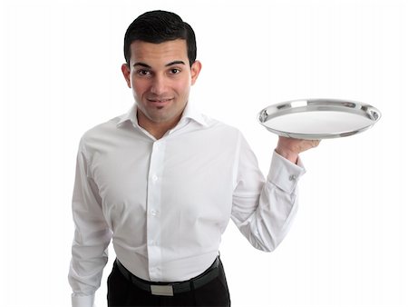 A waiter or bartender, or servant holding a round silver tray and smiling.  White background. Stock Photo - Budget Royalty-Free & Subscription, Code: 400-04207628