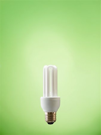 simsearch:400-04366277,k - fluorescent lightbulb on green background. Vertical shape, copy space Stock Photo - Budget Royalty-Free & Subscription, Code: 400-04207971