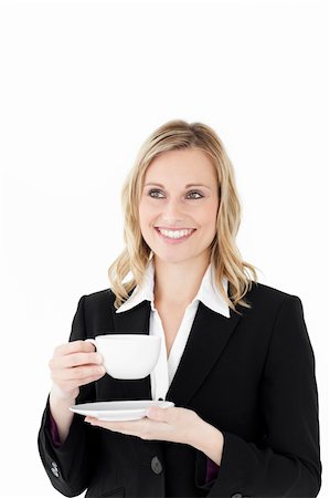 simsearch:400-05242665,k - Charming businesswoman with cup of coffee against white background Foto de stock - Super Valor sin royalties y Suscripción, Código: 400-04207995