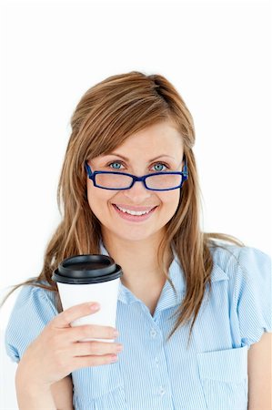 simsearch:400-04188263,k - Pretty caucasian businesswoman holding a coffee wearing glasses against white background Foto de stock - Super Valor sin royalties y Suscripción, Código: 400-04208068