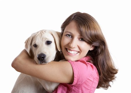 Beautiful young woman  embracing a cute dog Stock Photo - Budget Royalty-Free & Subscription, Code: 400-04208255