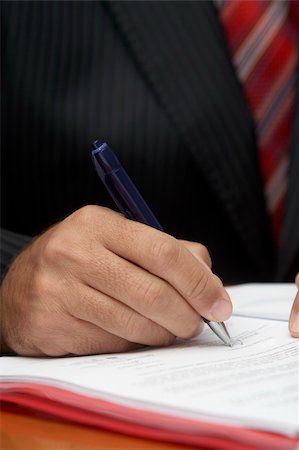 financial meeting tablet - close up of businessman hands signing contract Stock Photo - Budget Royalty-Free & Subscription, Code: 400-04208560
