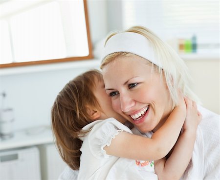 Shining mother taking care of her child at home Stock Photo - Budget Royalty-Free & Subscription, Code: 400-04208821