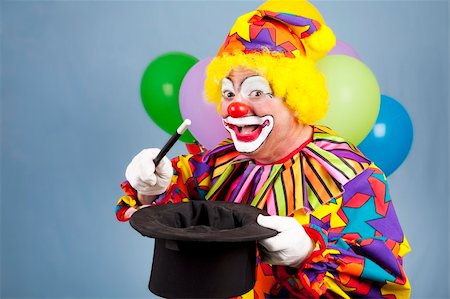 simsearch:400-04408991,k - Happy birthday clown doing magic tricks with a top hat and wand. Foto de stock - Super Valor sin royalties y Suscripción, Código: 400-04208948