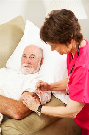 Homebound senior man gets an injection from his nurse. Stock Photo - Budget Royalty-Free & Subscription, Code: 400-04208972