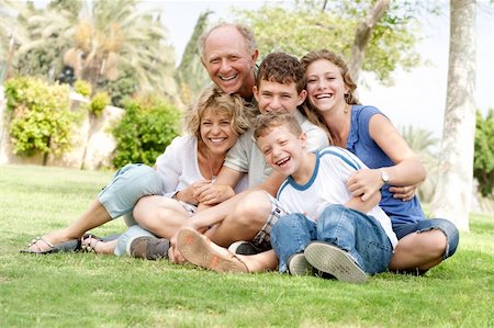 Extended group portrait of family enjoying day in park Stock Photo - Budget Royalty-Free & Subscription, Code: 400-04209140