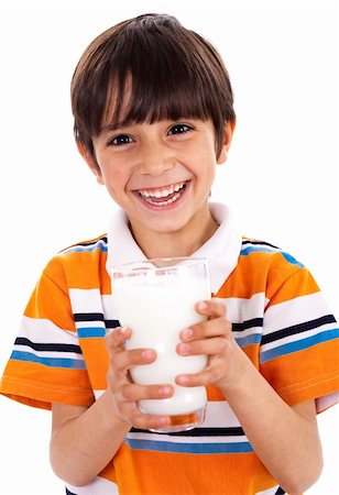 simsearch:400-04218582,k - Young kid holding a glass of milk isolated on white background Stockbilder - Microstock & Abonnement, Bildnummer: 400-04209304
