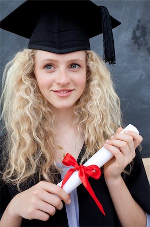 Teenage Girl Celebrating Graduation in the class Stock Photo - Budget Royalty-Free & Subscription, Code: 400-04200211