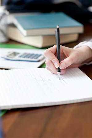 simsearch:400-04484714,k - Close-up of a woman studying at home Stock Photo - Budget Royalty-Free & Subscription, Code: 400-04200670