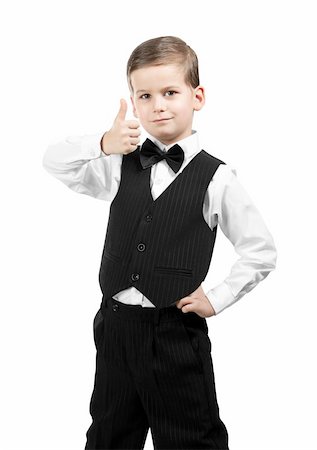 Boy holding a briefcase isolated on white background Stock Photo - Budget Royalty-Free & Subscription, Code: 400-04201044