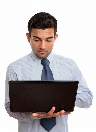 simsearch:400-04204942,k - Businessman using a laptop computer.  White background. Stock Photo - Budget Royalty-Free & Subscription, Code: 400-04201548