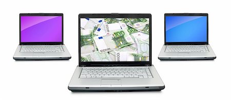 simsearch:400-04732690,k - Open laptops with money  isolated on white background Stock Photo - Budget Royalty-Free & Subscription, Code: 400-04201648