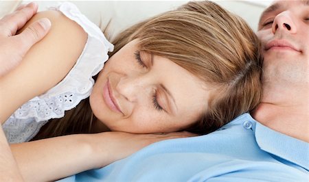 simsearch:400-06415374,k - Close-up of a young couple sleeping lying on a sofa at home Stock Photo - Budget Royalty-Free & Subscription, Code: 400-04202061