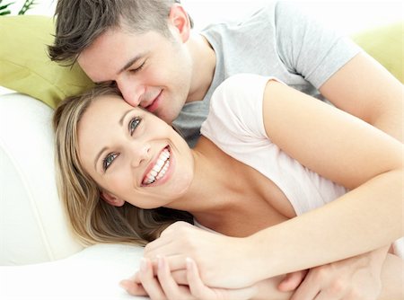 divert - Cute lovers having fun together in the living-room at home Stock Photo - Budget Royalty-Free & Subscription, Code: 400-04202079