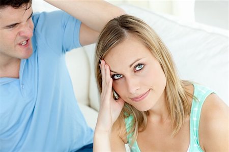 divert - Stressed couple having an argue in the living-room at home Stock Photo - Budget Royalty-Free & Subscription, Code: 400-04202083