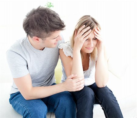 divert - Tired couple having an argue together in the living-room Stock Photo - Budget Royalty-Free & Subscription, Code: 400-04202128