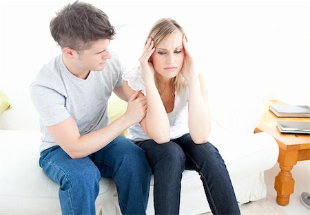 divert - Exhausted couple having an argue together in the living-room Stock Photo - Budget Royalty-Free & Subscription, Code: 400-04202129