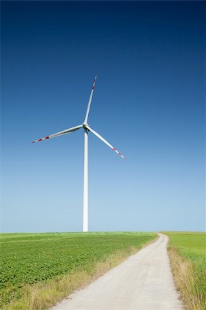 simsearch:400-04983141,k - wind turbine and empty country road Stock Photo - Budget Royalty-Free & Subscription, Code: 400-04202543