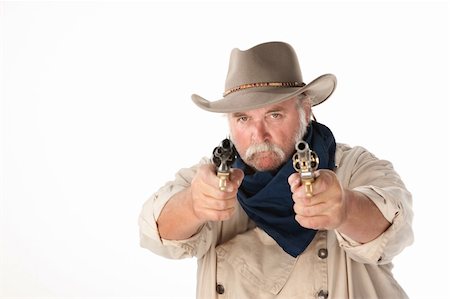 photos of cowboy mustaches - Big cowboy pointing pistols on white background Stock Photo - Budget Royalty-Free & Subscription, Code: 400-04203053