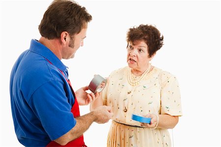 Customer asks a sales clerk which type of tape is better for her project.  Isolated on white. Foto de stock - Super Valor sin royalties y Suscripción, Código: 400-04203921