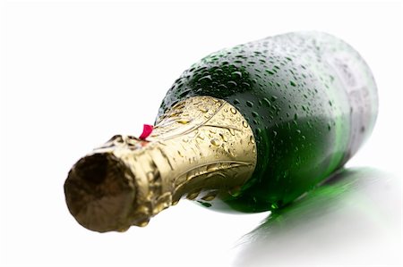 Cold wet bottle of champagne wine on white background Stock Photo - Budget Royalty-Free & Subscription, Code: 400-04215957