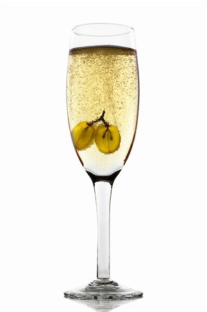 Grapes floating in champagne glass creating lots of bubbles Stock Photo - Budget Royalty-Free & Subscription, Code: 400-04215962