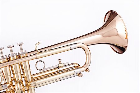 A professional gold trumpet isolated against a white background. Stock Photo - Budget Royalty-Free & Subscription, Code: 400-04216841