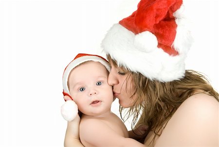 simsearch:400-09222788,k - Beautiful mommy santa and her baby Santa boy on a white Photographie de stock - Aubaine LD & Abonnement, Code: 400-04216959