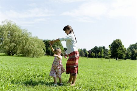 simsearch:400-04612785,k - mother and daughter having fun on meadow Stock Photo - Budget Royalty-Free & Subscription, Code: 400-04218277