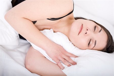 simsearch:400-04410507,k - young adult woman sleeping in bed Stock Photo - Budget Royalty-Free & Subscription, Code: 400-04218298