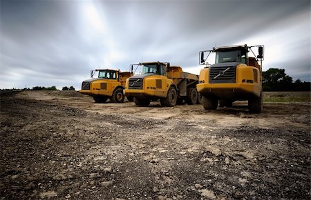 farmer digging - trucks  long exposure a windy day Stock Photo - Budget Royalty-Free & Subscription, Code: 400-04218340