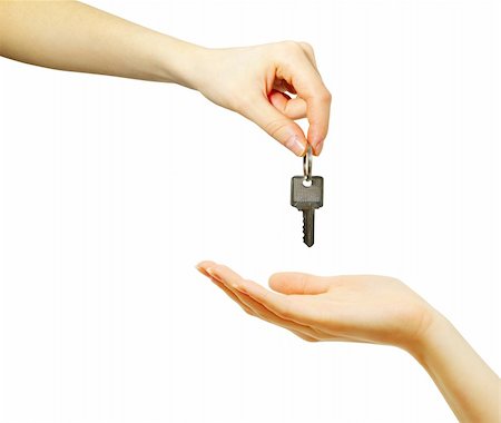 simsearch:400-04350998,k - hand holds a key isolated on white Stock Photo - Budget Royalty-Free & Subscription, Code: 400-04219512
