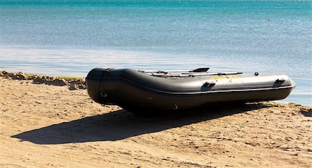 Inflatable boat on seacoast Stock Photo - Budget Royalty-Free & Subscription, Code: 400-04219527