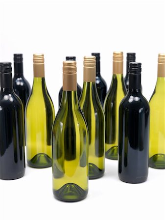 Bottles of red and white wine isolated against a white background Stock Photo - Budget Royalty-Free & Subscription, Code: 400-04219540