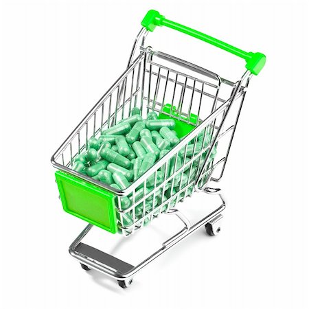Carts on a white background filled with pills Stock Photo - Budget Royalty-Free & Subscription, Code: 400-04210000