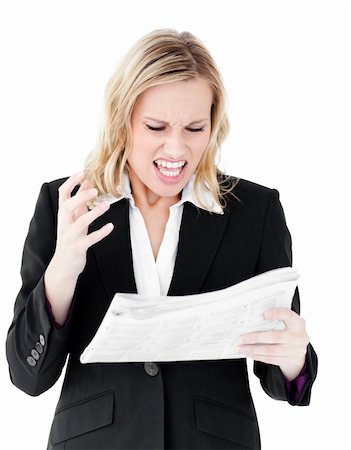 Aggressive businesswoman looking at a newspaper shouting against white background Stock Photo - Budget Royalty-Free & Subscription, Code: 400-04210063
