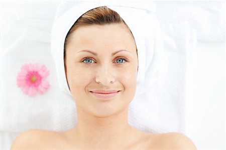 simsearch:400-04044944,k - Portrait of a happy woman in a spa center smiling at the camera Stock Photo - Budget Royalty-Free & Subscription, Code: 400-04210124