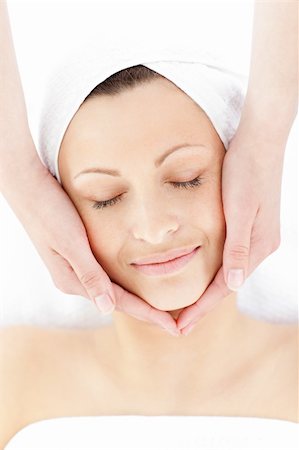 simsearch:400-04044944,k - Pretty young woman enjoying a facial massage in a spa center Foto de stock - Royalty-Free Super Valor e Assinatura, Número: 400-04210134