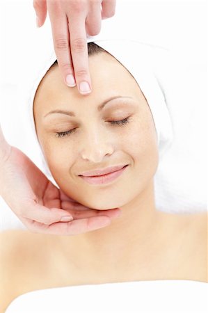simsearch:400-04044944,k - Relaxed  woman enjoying a head massage in a spa center Stock Photo - Budget Royalty-Free & Subscription, Code: 400-04210130
