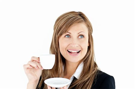 simsearch:400-05242665,k - Elegant young businesswoman holding a cup of coffee against white background Foto de stock - Super Valor sin royalties y Suscripción, Código: 400-04210171