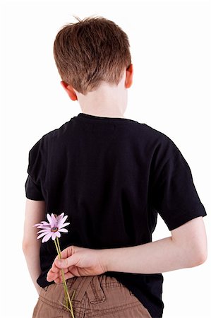 simsearch:400-07726699,k - Young boy hiding flowers behind his back, isolated on white, studio shot Foto de stock - Super Valor sin royalties y Suscripción, Código: 400-04210199