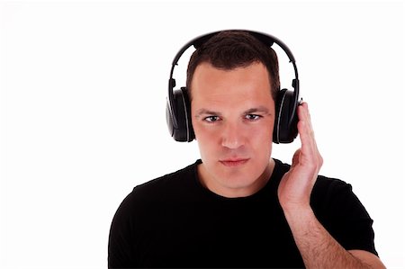 man listening music in headphones, isolated on white background, studio shot Stock Photo - Budget Royalty-Free & Subscription, Code: 400-04210204