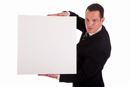 employee hold a sign - Businessman holding a white board, looking to camera, ioslated on white background Stock Photo - Budget Royalty-Free & Subscription, Code: 400-04210208