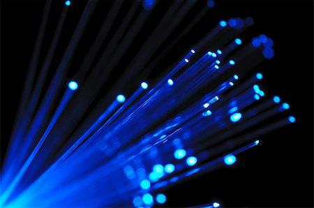 Blue optical fibers against  the black background Stock Photo - Budget Royalty-Free & Subscription, Code: 400-04210348