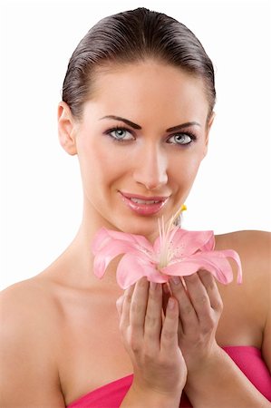 simsearch:400-04231314,k - Fresh clear healthy portrait of brunette girl with a pink lily looking in camera Foto de stock - Super Valor sin royalties y Suscripción, Código: 400-04210465